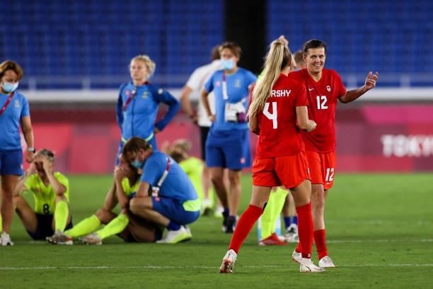 Christine Sinclair of Canada celebrate the victory with Shelina Zadorsky after the penalty shot out of the Olympic women's football gold medal match...