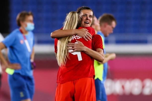 Christine Sinclair of Canada celebrate the victory with Shelina Zadorsky after the penalty shot out of the Olympic women's football gold medal match...