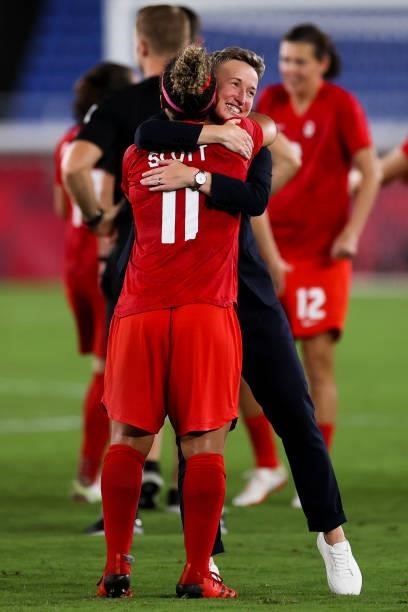 Bev Priestman head coach of Canada celebrate the victory with Desiree Scott after the penalty shot out of the Olympic women's football gold medal...