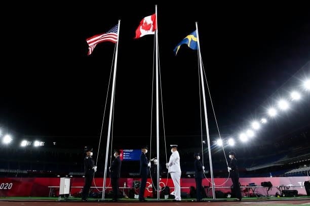 National flag of United States, Canada, Sweden is seen during the Olympic women's football gold medal match between Sweden and Canada at...