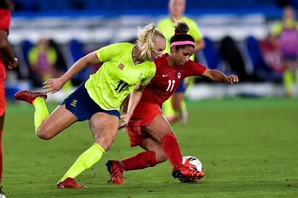 Stina Blackstenius of Sweden and Desiree Scott of Canada during the Tokyo 2020 Olympic Women's Football Tournament Gold Medal match between Sweden...