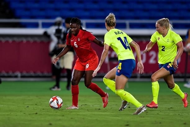 Deanne Rose of Canada and Nathalie Bjorn of Sweden during the Tokyo 2020 Olympic Women's Football Tournament Gold Medal match between Sweden and...