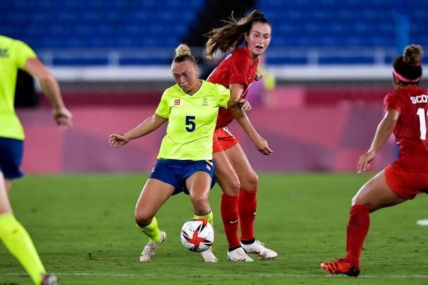 Hanna Bennison of Sweden and Jordyn Huitema of Canada during the Tokyo 2020 Olympic Women's Football Tournament Gold Medal match between Sweden and...