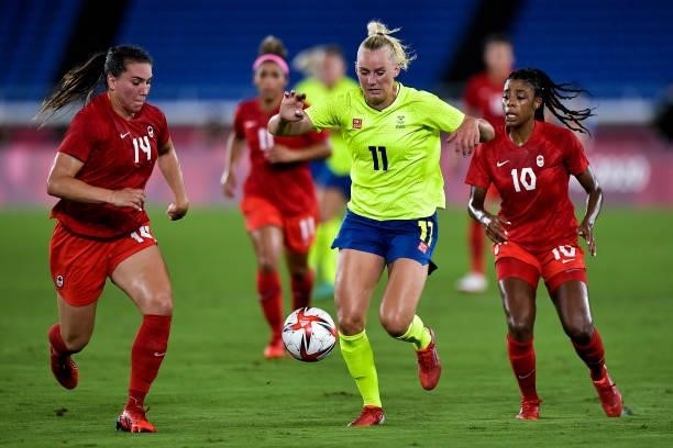 Vanessa Gilles of Canada, Stina Blackstenius of Sweden and Ashley Lawrence of Canada during the Tokyo 2020 Olympic Women's Football Tournament Gold...