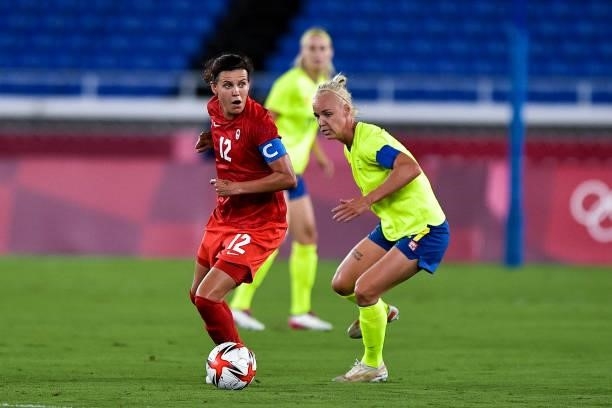 Christine Sinclair of Canada and Caroline Seger of Sweden during the Tokyo 2020 Olympic Women's Football Tournament Gold Medal match between Sweden...