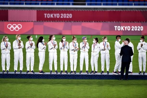 The team of the United States receives the bronze medal during the Tokyo 2020 Olympic Women's Football Tournament Gold Medal match between Sweden and...