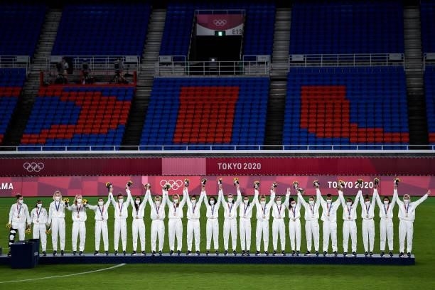 The team of the United States after receiving the bronze medal during the Tokyo 2020 Olympic Womens Football Tournament Gold Medal match between...