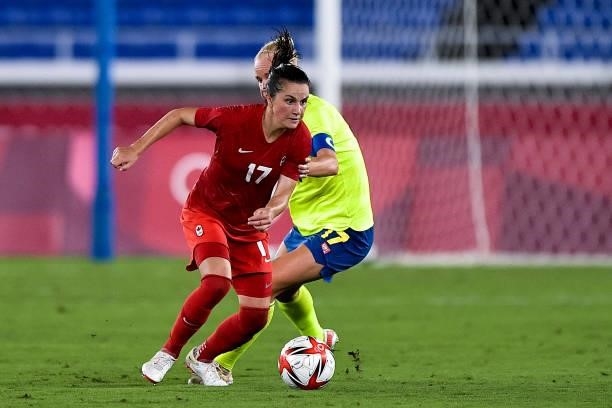 Jessie Fleming of Canada and Caroline Seger of Sweden during the Tokyo 2020 Olympic Womens Football Tournament Gold Medal match between Sweden and...