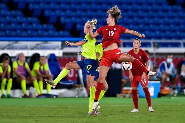 Caroline Seger of Sweden and Jordyn Huitema of Canada during the Tokyo 2020 Olympic Womens Football Tournament Gold Medal match between Sweden and...