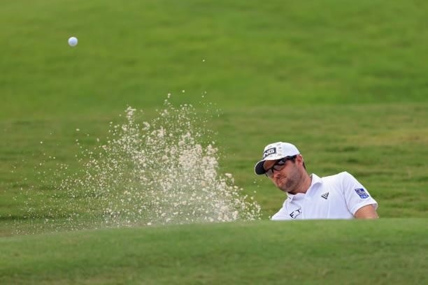 Corey Conners of Canada plays his shot from the bunker on the seventh hole during the second round of the FedEx St. Jude Invitational at TPC...