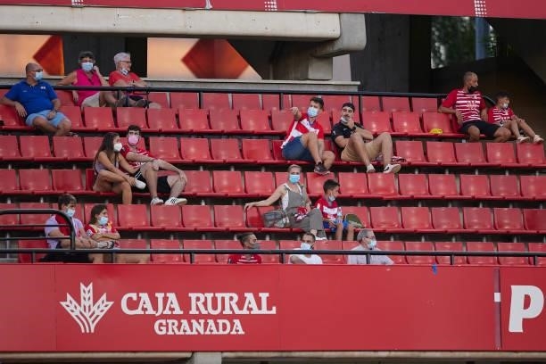 People in the stands watch the game after a year and five months later due to the COVID-19 pandemic and the closure of stadiums during the Ciudad de...