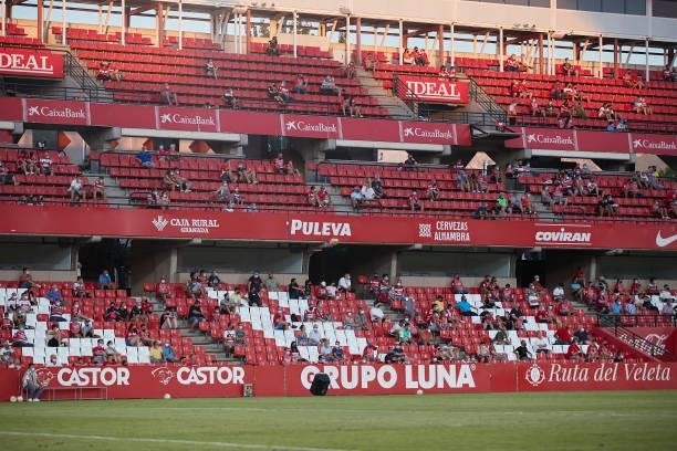 People in the stands watch the game after a year and five months later due to the COVID-19 pandemic and the closure of stadiums during the Ciudad de...