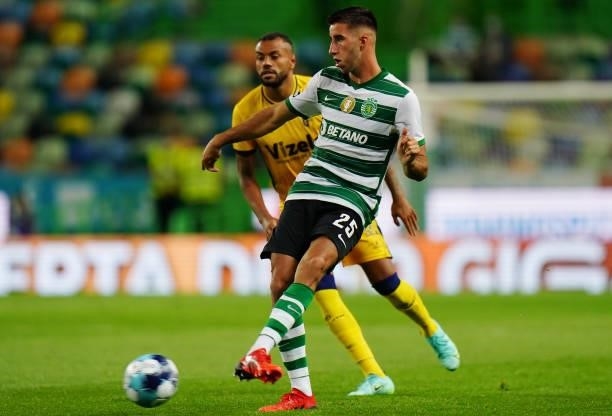 Goncalo Inacio of Sporting CP makes a pass under pressure of Cassiano of FC Vizela in action during the Liga Bwin match between Sporting CP and FC...