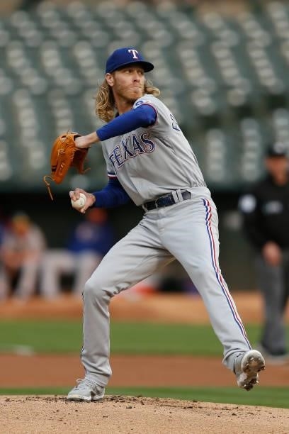 Mike Foltynewicz of the Texas Rangers pitches in the bottom of the first inning against the Oakland Athletics at RingCentral Coliseum on August 06,...