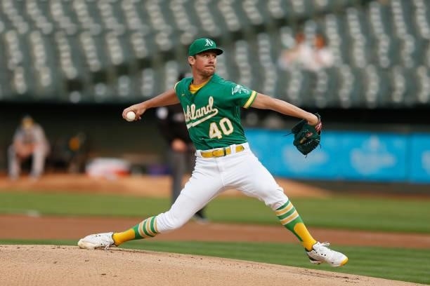 Chris Bassitt of the Oakland Athletics pitches in the top of the first inning against the Texas Rangers at RingCentral Coliseum on August 06, 2021 in...