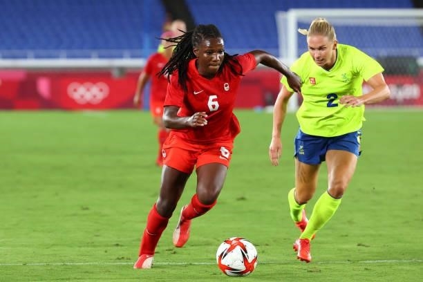 Deanne Rose of Team Canada controls the ball against Jonna Andersson of Team Sweden during the second half during the women's football gold medal...