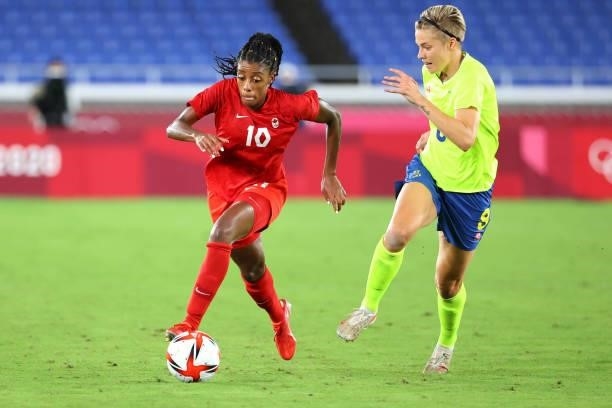 Ashley Lawrence of Team Canada controls the ball against Lina Hurtig of Team Sweden during the second half during the women's football gold medal...