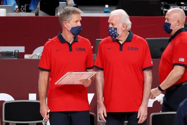 Team United States Head Coach Gregg Popovich and Assistant Coach Steve Kerr talk strategy during the first half of a Men's Basketball Finals game...