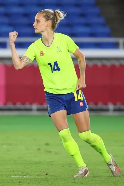 Nathalie Bjorn of Team Sweden celebrates after making her shot during the penalty kick shoot-out during the women's football gold medal match between...