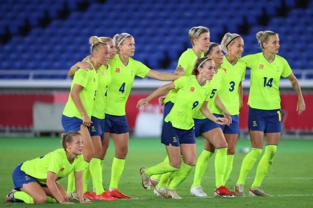Team Sweden looks on during the penalty kick shoot-out during the women's football gold medal match between Canada and Sweden on day fourteen of the...