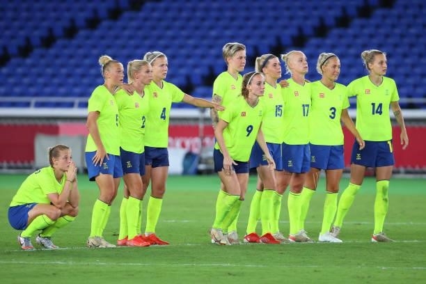Team Sweden looks on during the penalty kick shoot-out during the women's football gold medal match between Canada and Sweden on day fourteen of the...