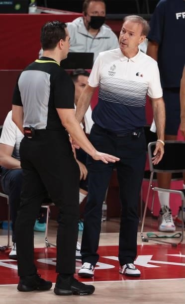 Team France Head Coach Vincent Collet questions the official about a call during the first half of a Men's Basketball Finals game between Team United...