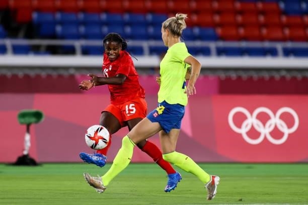 Nichelle Prince of Team Canada pass the ball during the Olympic women's football gold medal match between Sweden and Canada at International Stadium...