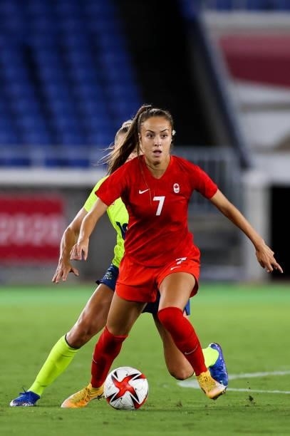 Julia Grosso of Team Canada controls the ball during the Olympic women's football gold medal match between Sweden and Canada at International Stadium...
