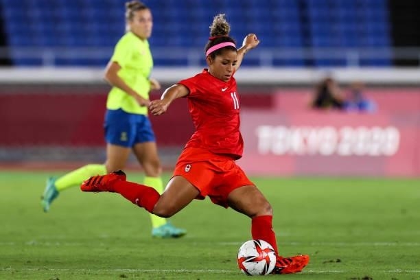 Desiree Scott of Team Canada pass the ball during the Olympic women's football gold medal match between Sweden and Canada at International Stadium...