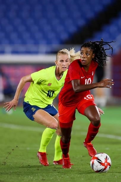 Ashley Lawrence of Team Canada controls the ball during the Olympic women's football gold medal match between Sweden and Canada at International...