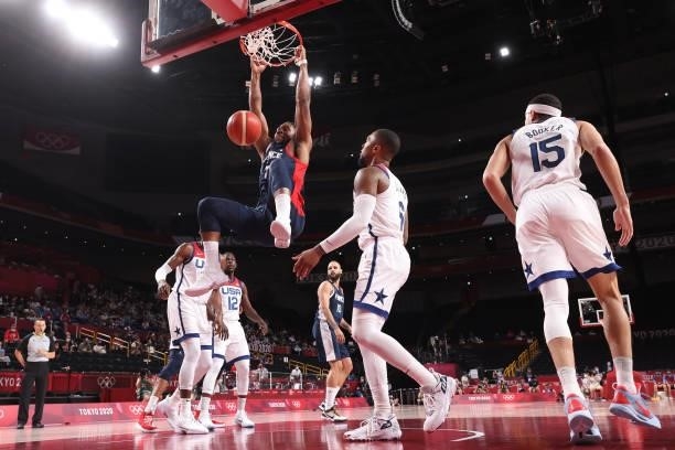 Guerschon Yabusele of Team France dunks against Damian Lillard of Team United States during the first half of a Men's Basketball Finals game on day...