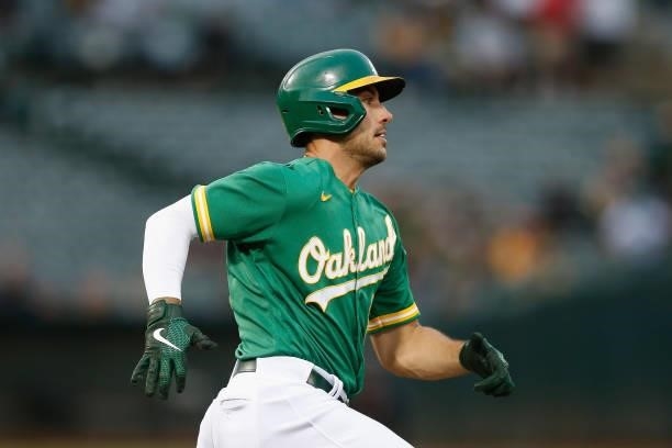 Matt Olson of the Oakland Athletics runs to second base on a ground rule double in the bottom of the fourth inning against the Texas Rangers at...