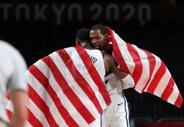 Bam Adebayo of Team United States hugs teammate Kevin Durant following the United States' victory over France in the Men's Basketball Finals game on...