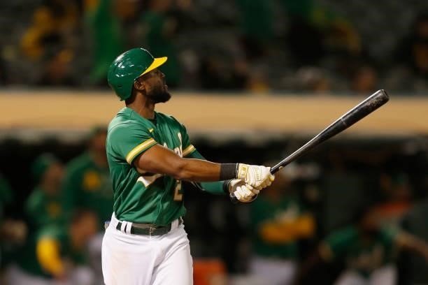 Starling Marte of the Oakland Athletics hits a walk-off three-run home run in the bottom of the eleventh inning against the Texas Rangers at...