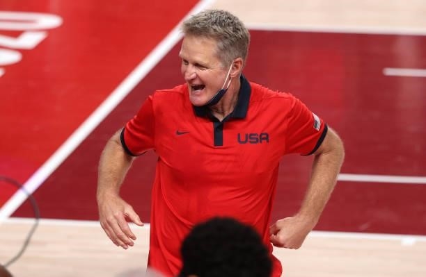 Team United States Assistant Coach Steve Kerr celebrates the United States' victory over France in the Men's Basketball Finals game on day fifteen of...
