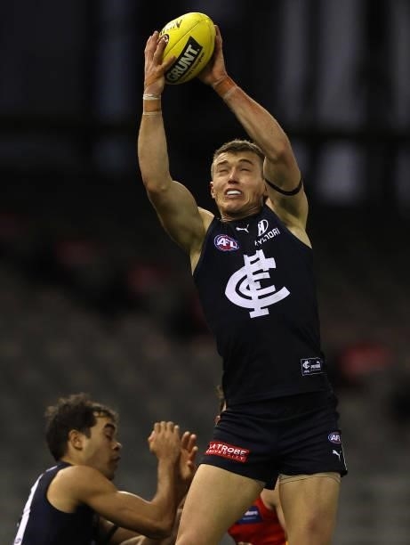 Patrick Cripps of the Blues takes the ball during the round 21 AFL match between Carlton Blues and Gold Coast Suns at Marvel Stadium on August 07,...