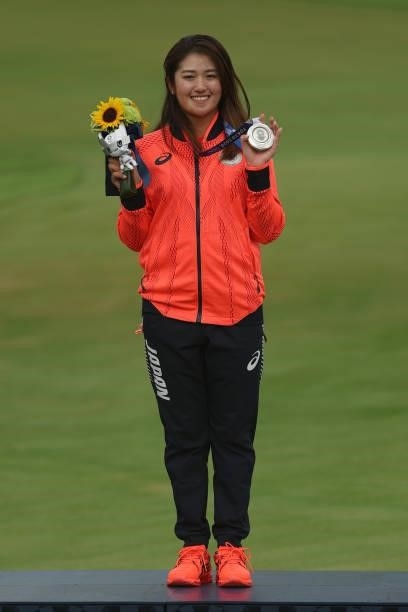 Mone Inami of Team Japan celebrates with the silver medal at the victory ceremony after the final round of the Women's Individual Stroke Play on day...