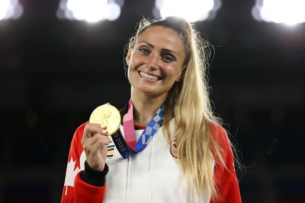Shelina Zadorsky of Team Canada celebrates with her Gold medal after her teams victory in the Gold Medal Match Women's Football match between Canada...