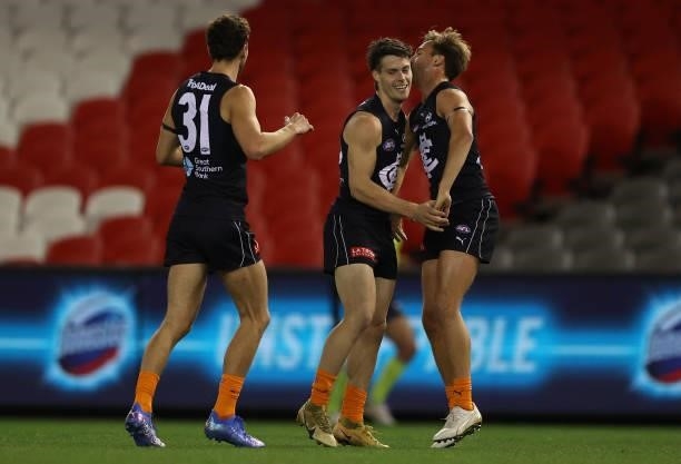 Josh Honey of the Blues celebrates after scoring a goal during the round 21 AFL match between Carlton Blues and Gold Coast Suns at Marvel Stadium on...