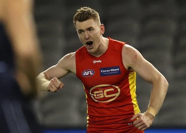 Jacob Townsend of the Suns celebrates after scoring a goal during the round 21 AFL match between Carlton Blues and Gold Coast Suns at Marvel Stadium...