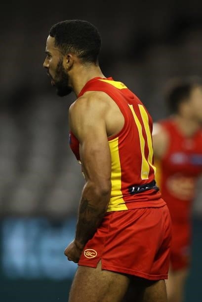 Touk Miller of the Suns celebrates after scoring a goal during the round 21 AFL match between Carlton Blues and Gold Coast Suns at Marvel Stadium on...