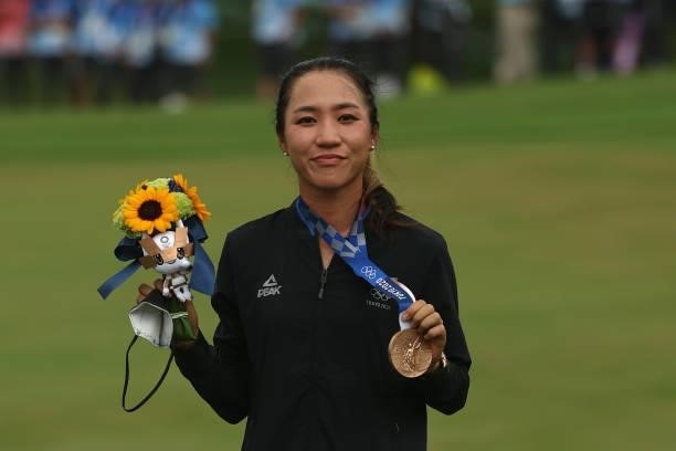 Lydia Ko of Team New Zealand celebrates with the bronze medal during the Victory Ceremony after the final round of the Women's Individual Stroke Play...