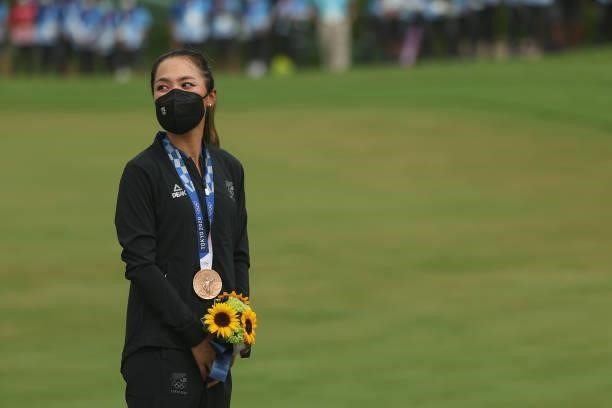 Lydia Ko of Team New Zealand looks on with the bronze medal during the Victory Ceremony after the final round of the Women's Individual Stroke Play...