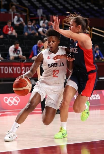 Yvonne Anderson of Team Serbia drives to the basket against Marine Fauthoux of Team France during the first half of a Women's Basketball Bronze medal...