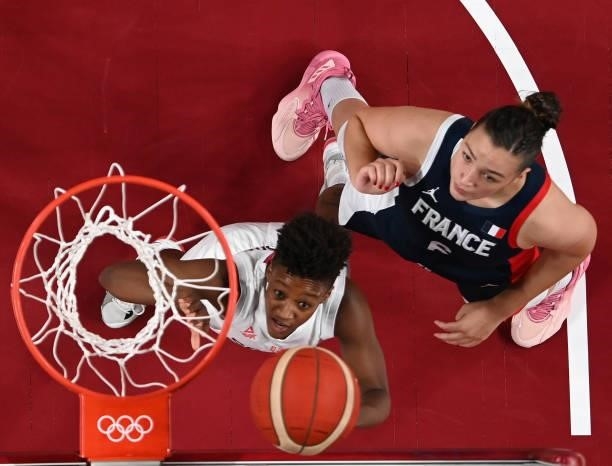 Yvonne Anderson of Team Serbia and Alexia Chartereau of Team France watch for a rebound during the first half of a Women's Basketball Bronze medal...