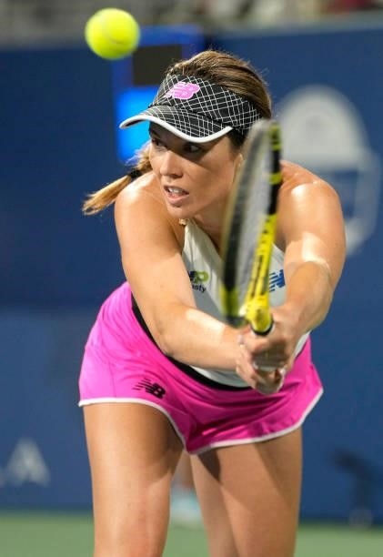 Danielle Collins of the United States returns a shot to Elena Rybakina of Kazakhstan during their quarterfinal match on Day 5 of the Mubadala Silicon...