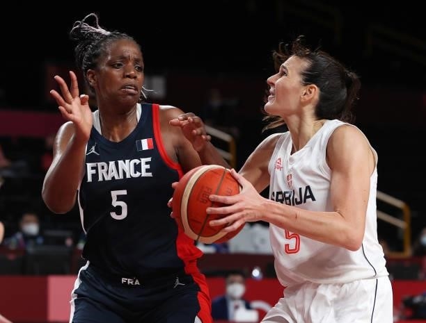 Sonja Vasic of Team Serbia drives to the basket against Endene Miyem of Team France during the second half of a Women's Basketball Bronze medal game...