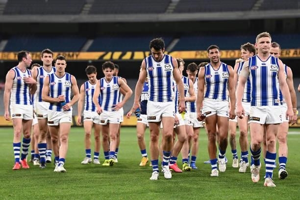 Jack Ziebell and his Kangaroos team mates look dejected after losing the round 21 AFL match between Richmond Tigers and North Melbourne Kangaroos at...