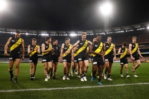 Maurice Rioli of the Tigers leads the Tigers off the field after winning the round 21 AFL match between Richmond Tigers and North Melbourne Kangaroos...