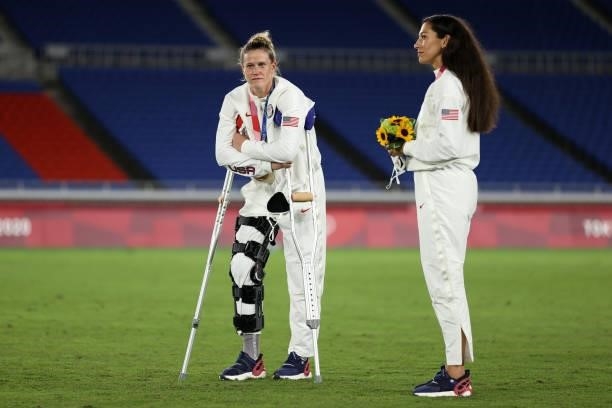 Alyssa Naeher and Christen Press of Team USA reacts after receiving her Bronze Medal following the Gold Medal Match Women's Football match between...